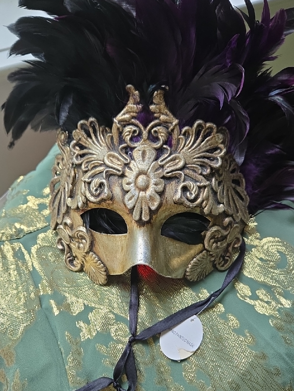 Gold Filigree Feather Mardi Gras Mask in Deep Purple